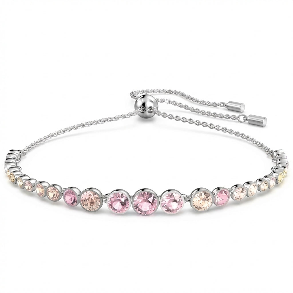 Silver bracelet with pink gemstones on a white background