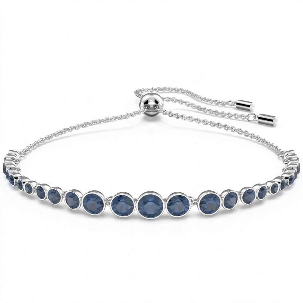 Silver bracelet with blue gemstones on a white background