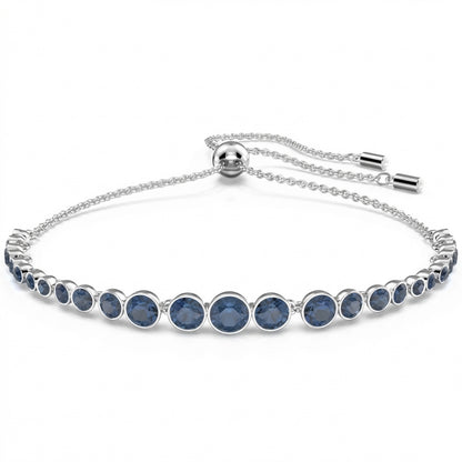 Silver bracelet with blue gemstones on a white background