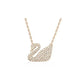 Rose gold swan-shaped necklace on a white background