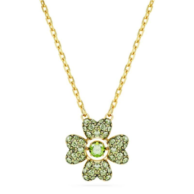 Swarovski Idyllia Pendant - Clover, GreenGold necklace with a green gemstone pendant on a white background