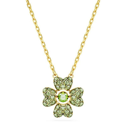 Swarovski Idyllia Pendant - Clover, GreenGold necklace with a green gemstone pendant on a white background