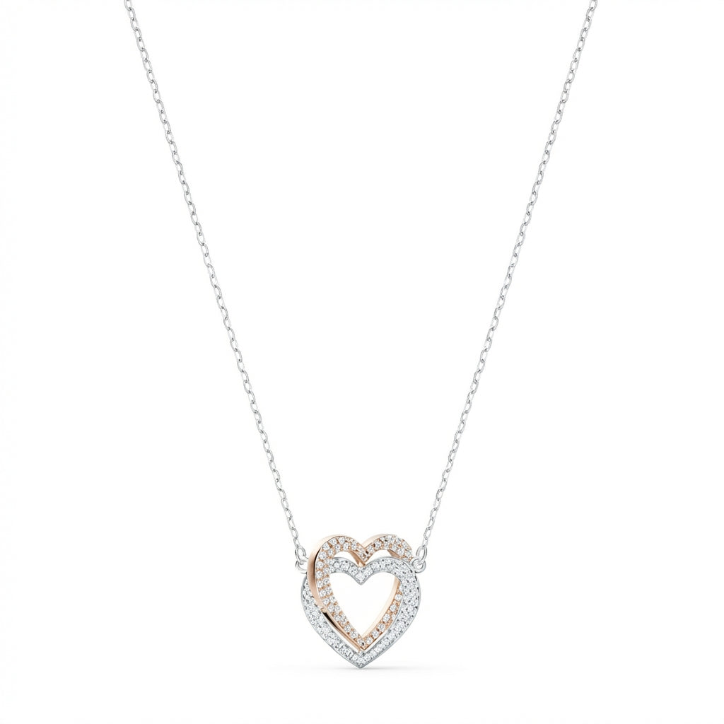 Heart-shaped necklace with rose gold and silver design on a white background