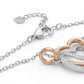 Jewelry with heart-shaped charms on a white background
