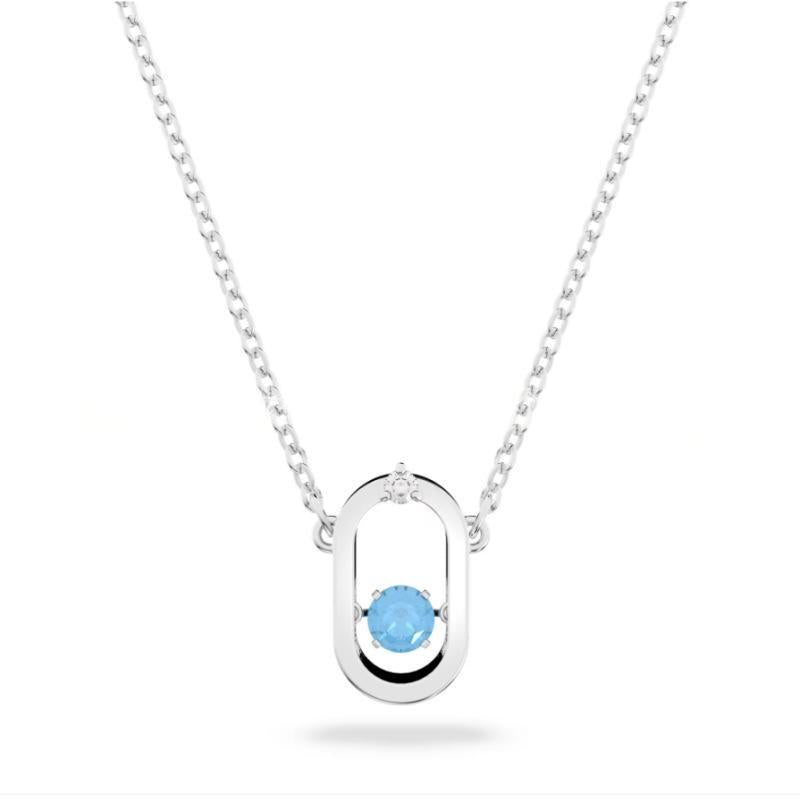 Swarovski Sparkling Dance necklace, Round cut, OvalSilver necklace with a blue gemstone pendant on a white background