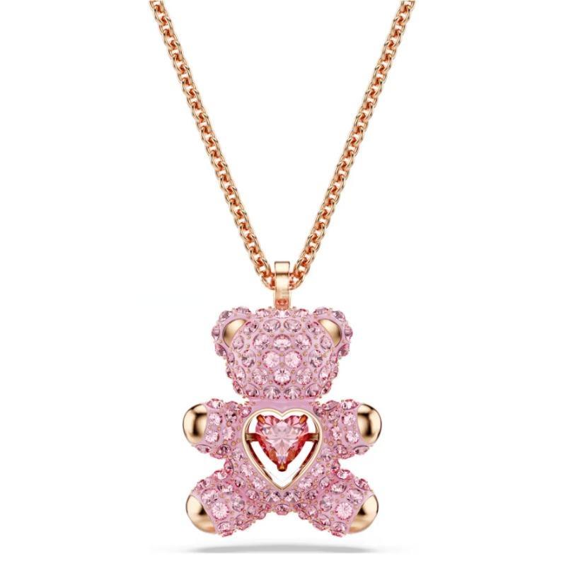 Swarovski Teddy pendant Bear, Pink, Rhodium platedPink teddy bear pendant necklace on a white background