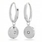 Focus on the wing silhouette, highlighting the crystal placement (pavé or single crystal), wing shape, and overall angelic aesthetic.