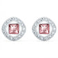 Pair of earrings with pink gemstones and silver circular designs on a white background