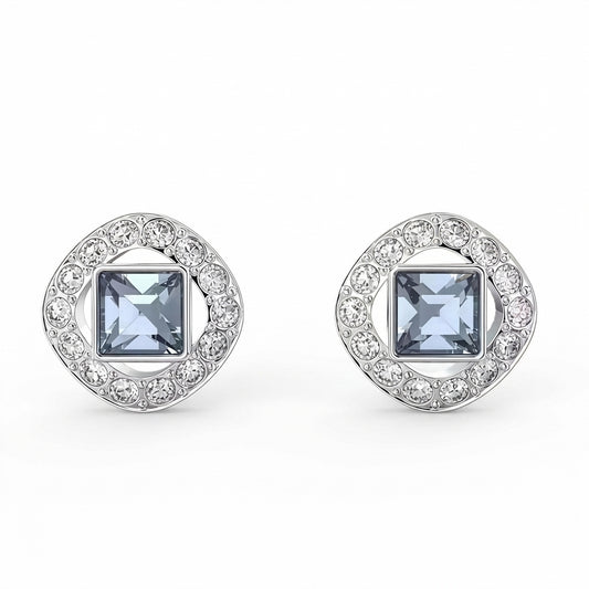 Pair of silver earrings with square gemstones on a white background