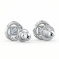 Pair of silver earrings with clear gemstones on a white background