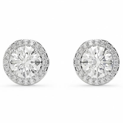 Pair of diamond stud earrings on a white background