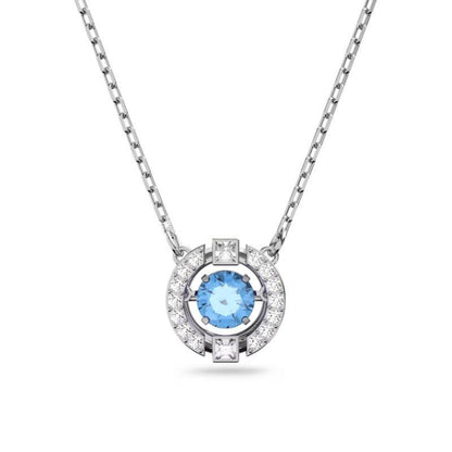 Swarovski Una Collection NecklaceSilver necklace with a blue gemstone pendant on a white background