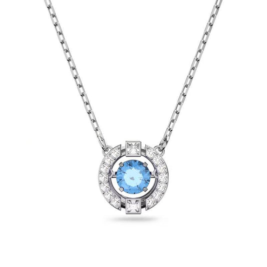 Swarovski Una Collection NecklaceSilver necklace with a blue gemstone pendant on a white background