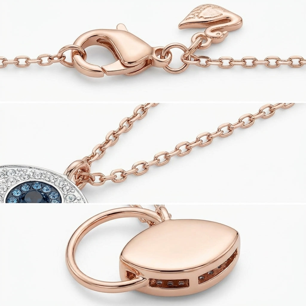 Rose gold necklace with a lock and chain on a white background
