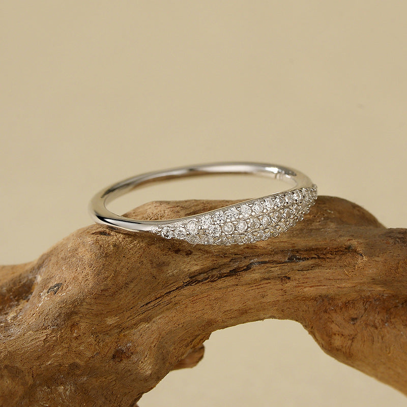 “Close-up of micro-pavé cubic zirconia detailing on sterling silver ring”