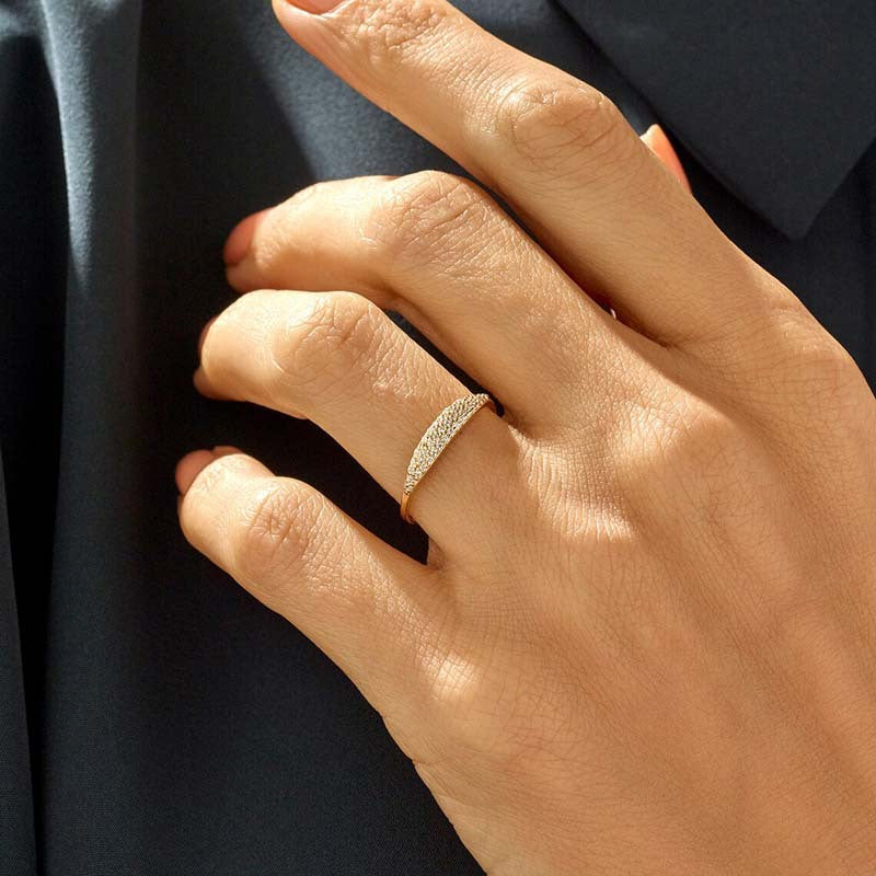 “Model wearing minimalist full-pavé silver ring showing refined sparkle”