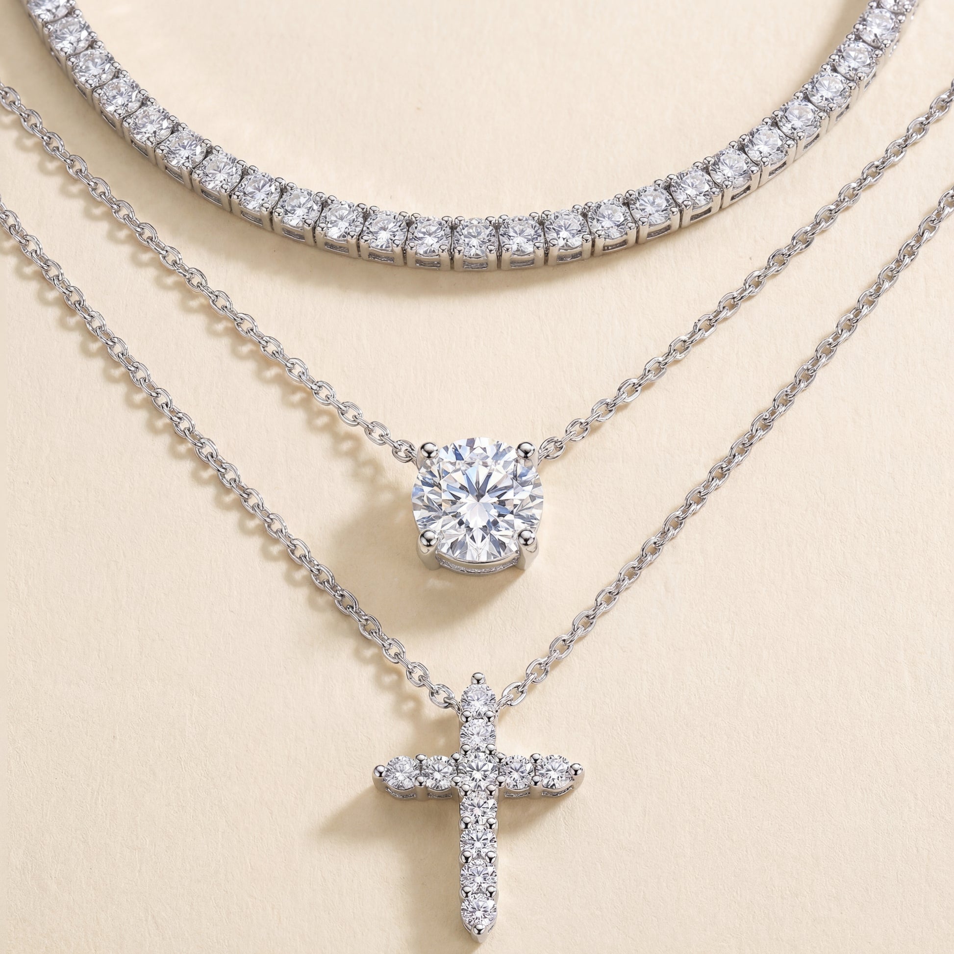 Extreme close-up of a section of both chains showing the pavé settings and stone quality.