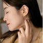 Model Wearing Bamboo-Inspired Silver Stud Earrings – Elegant Look