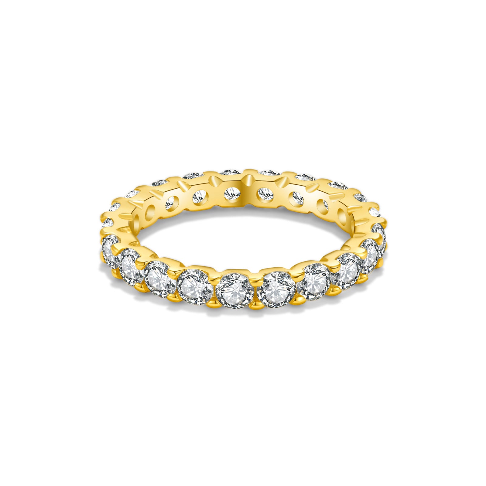 Gold ring with diamond stones on a white background