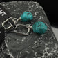 “Close-up of irregular raw turquoise stone set in S925 sterling silver”