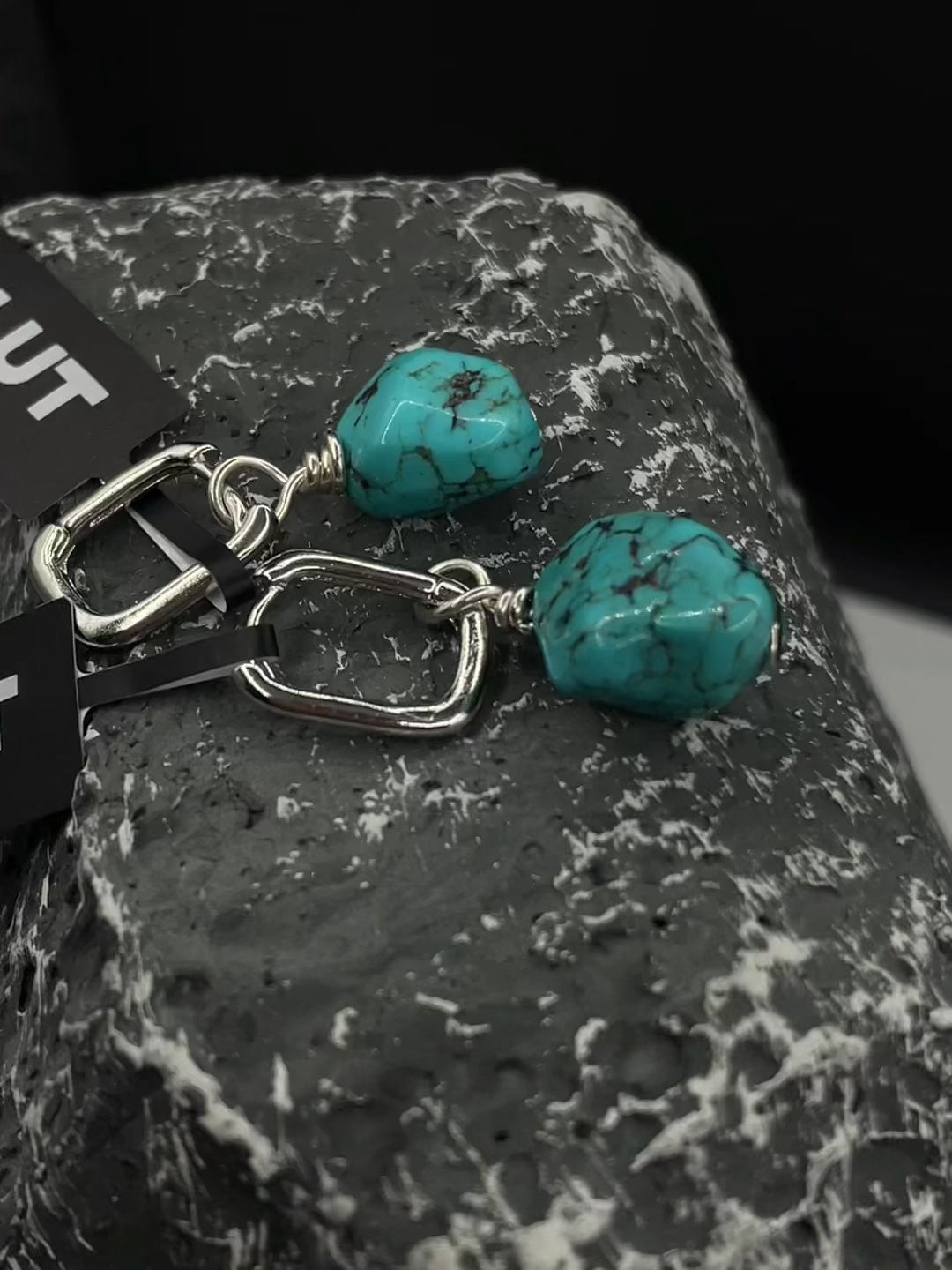 “Close-up of irregular raw turquoise stone set in S925 sterling silver”