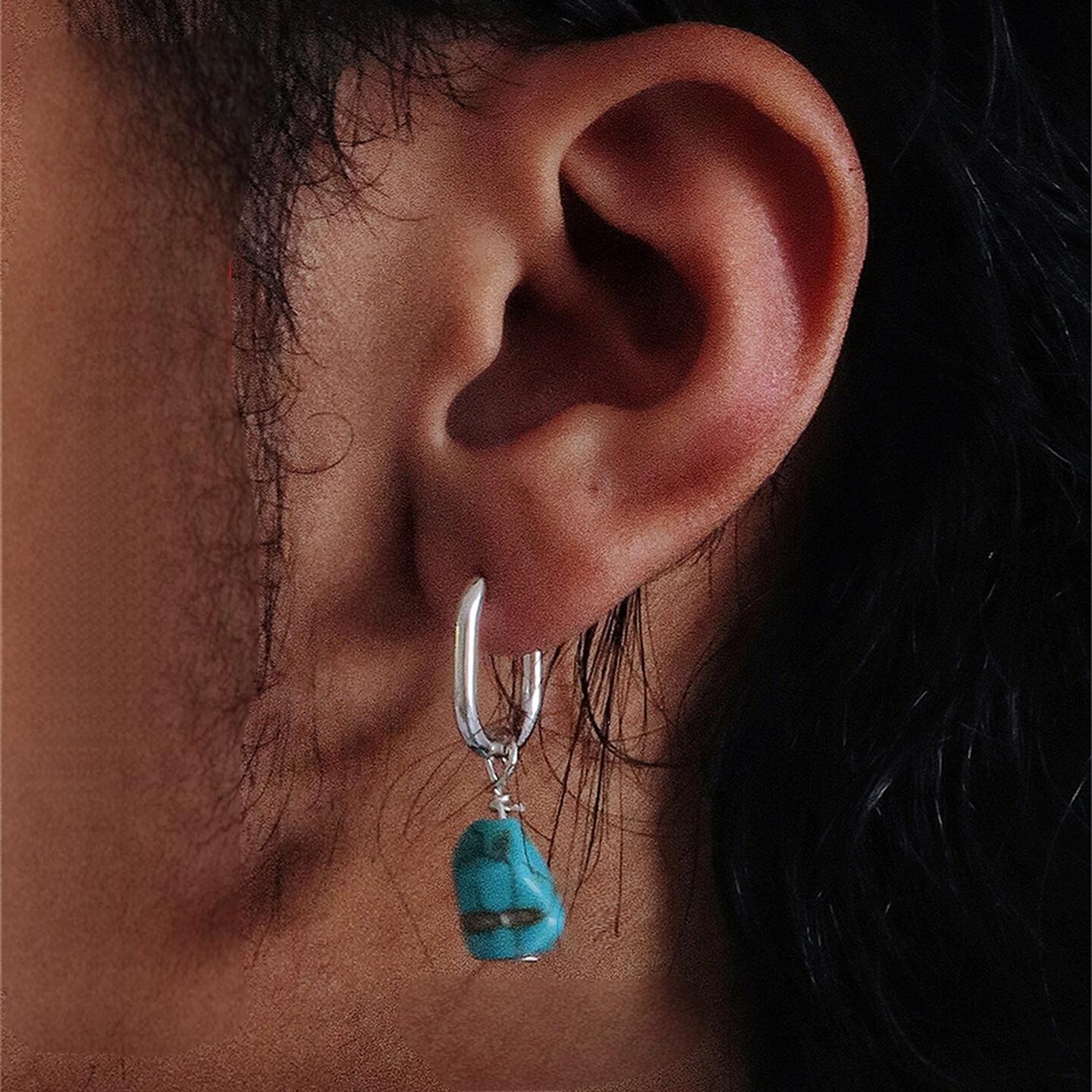 “Handmade Tibetan-style earrings styled on model – unique statement jewelry”