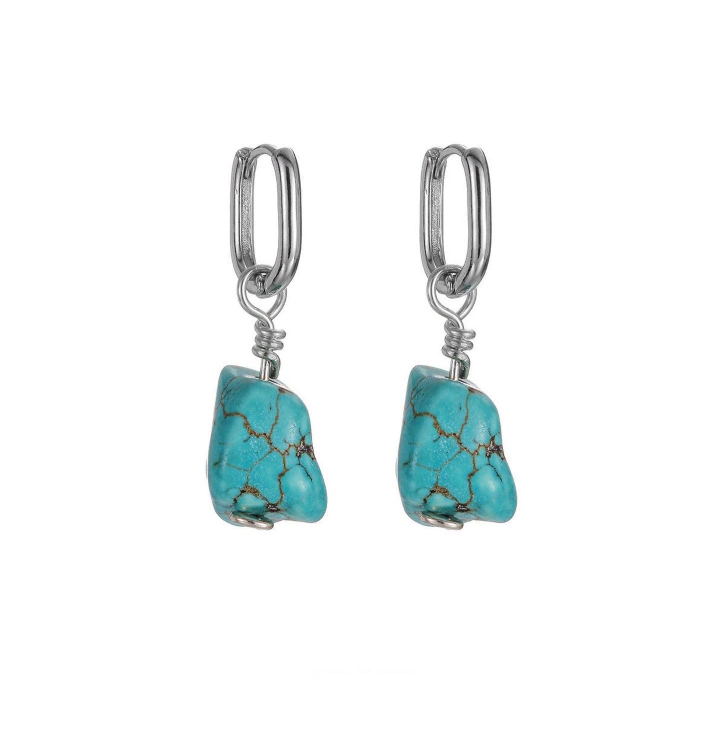 “Handmade Tibetan-style S925 silver earrings with raw turquoise – flat lay”