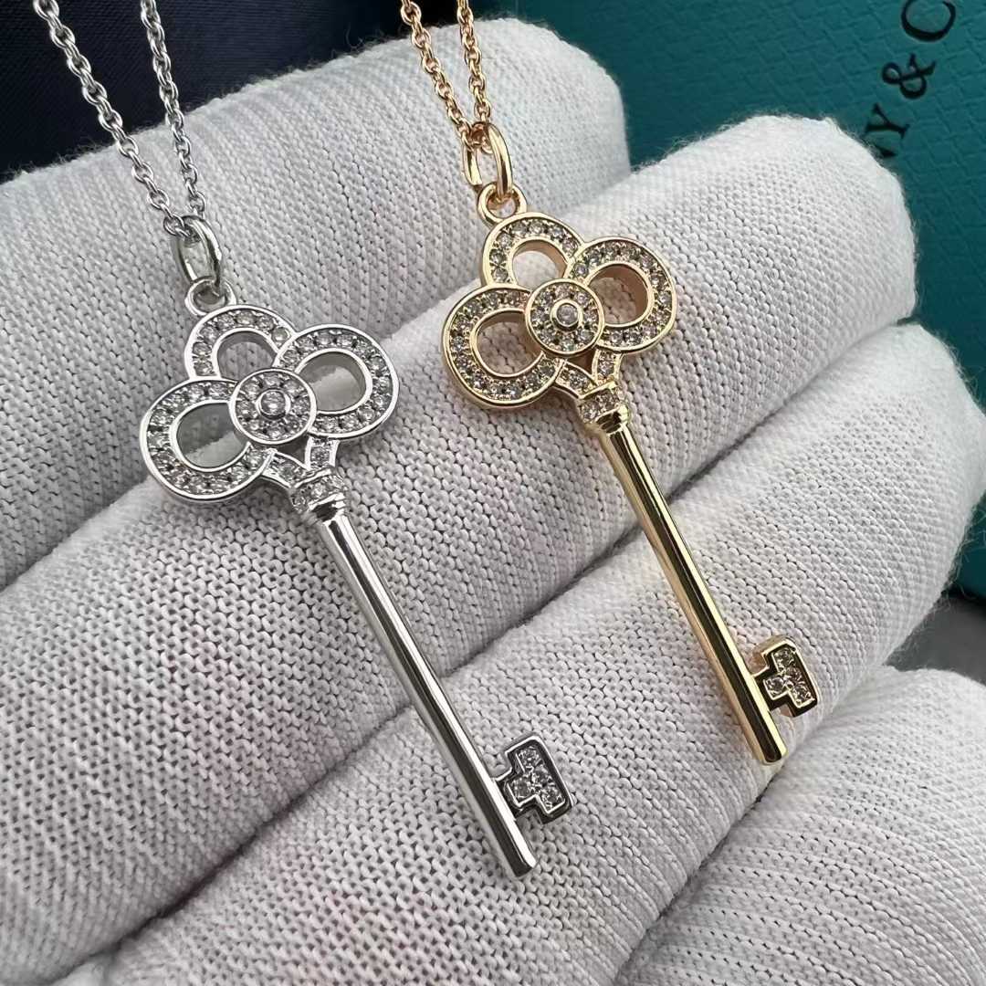 “Close-up of pavé set cubic zirconia on Tiffany crown key pendant”