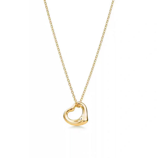 A gold open heart pendant necklace on a delicate gold chain, presented against a clean white background.