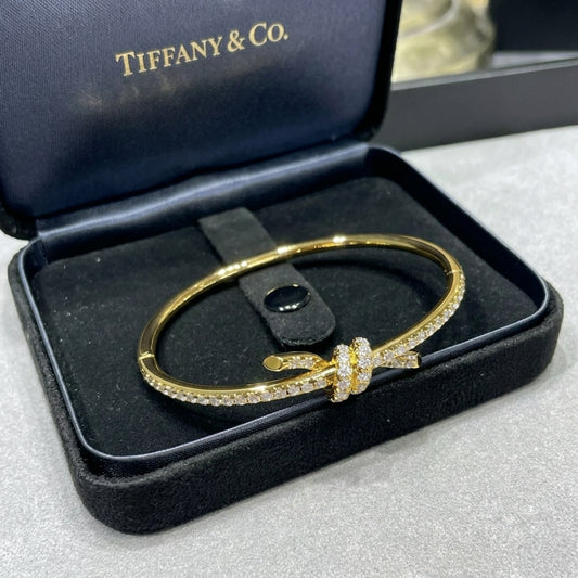 Tiffany Knot Wire Bangle in gold pave Diamonds