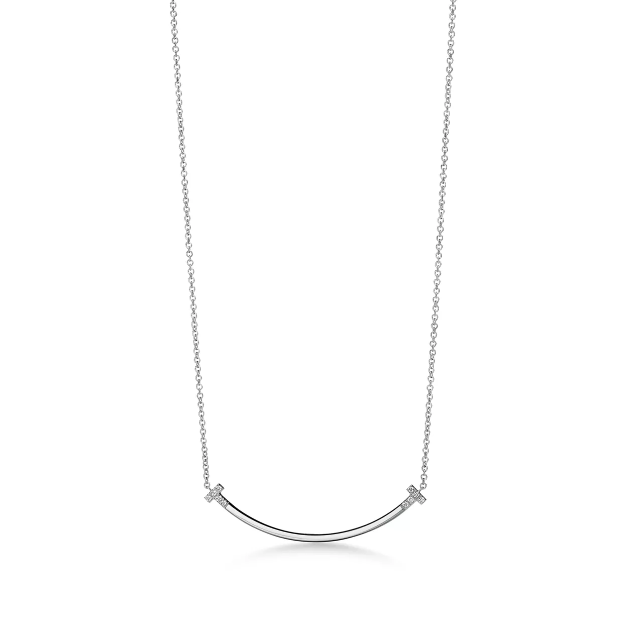 Silver curved necklace on a white background