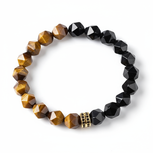 Bracelet with faceted beads in black and gold on a white background