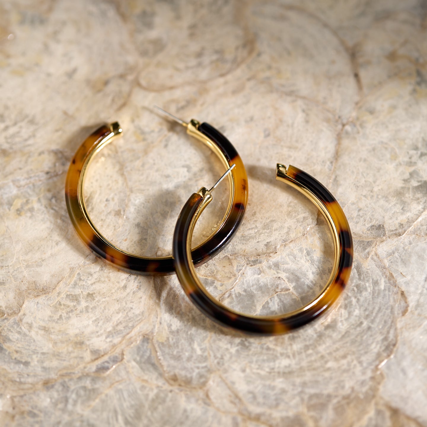 Close-up of Vintage Brown Tortoiseshell Hoop Earrings – Glossy Finish