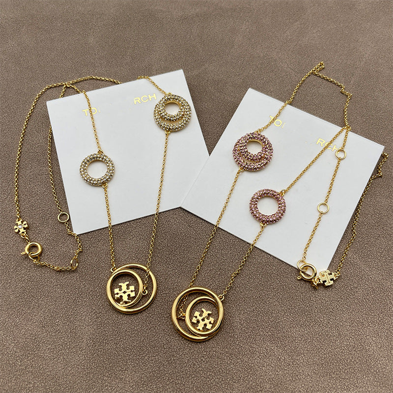 Close-up focused on the set of three graduating circles, highlighting their smooth polish and proportional design.