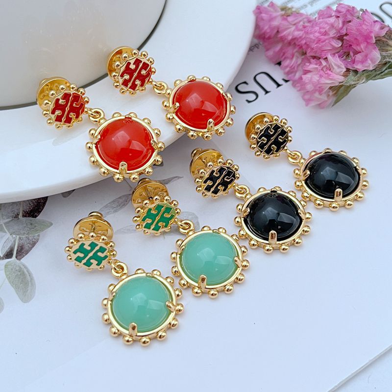 Macro shot tightly focused on the area where the black enamel meets the gold, showcasing the precision of the inlay and the rich finish.