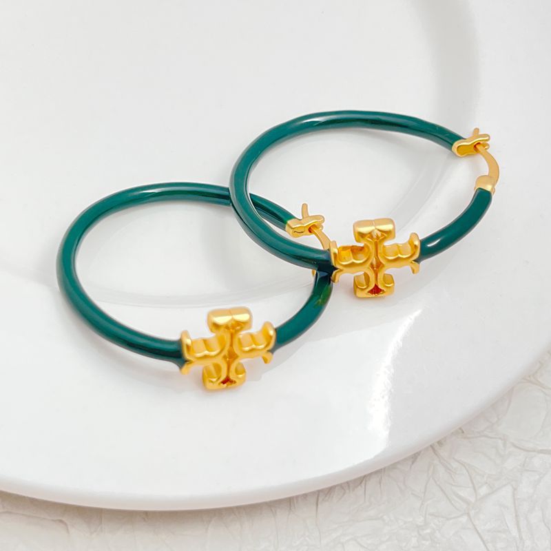  Clean, front-facing shot of a single hoop against a neutral background, clearly displaying the Double T logo as a distinct element within the hoop's circle.