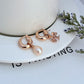 The mismatched hoops arranged with other simple studs or charms to inspire further ear styling.