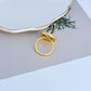  Clean shot of the ring on a light, airy background (like sand-colored or light blue), highlighting the shell detail and enamel color.