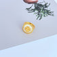  Clean shot of the ring on a light, airy background (like sand-colored or light blue), highlighting the shell detail and enamel color.