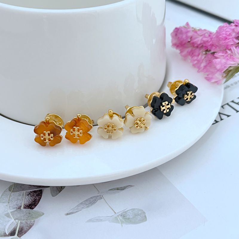 Styled in a personal, thoughtful setting—like a writing desk with stationery or a cherished book—to emphasize their meaningful nature.