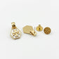 Gold-toned jewelry set featuring a hexagonal pendant with a white monogram logo, a matching hexagonal stud, a round matching stud, and a butterfly back, displayed on a clean white background.