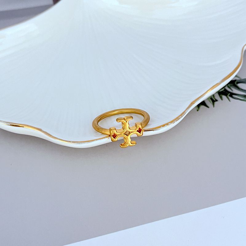  Clean, front-facing shot of the ring on a velvet pad or neutral background, highlighting the polished Double T logo.