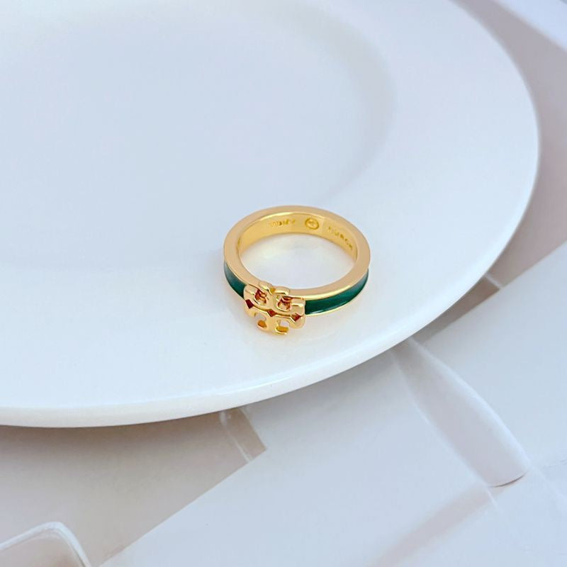 A fashion-forward individual wearing the ring with a neutral outfit, allowing the colorful ring to be the standout accessory.