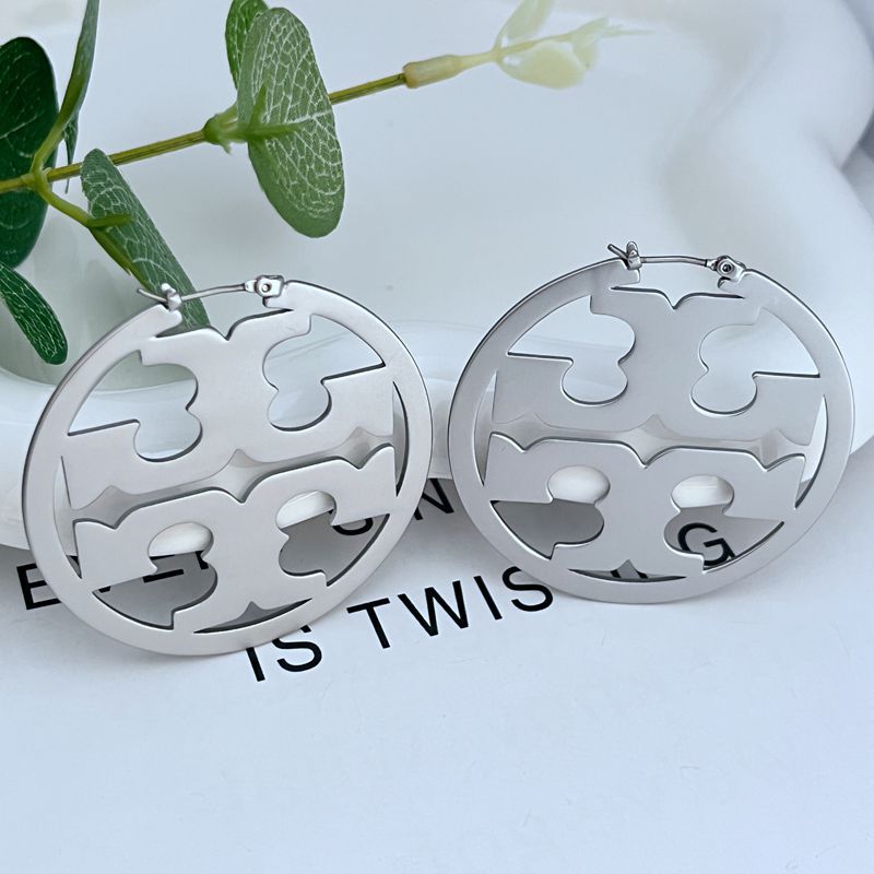 Clean, front-facing shot of a single hoop against a neutral background, clearly showcasing the Double T logo integrated into the hoop's curve.