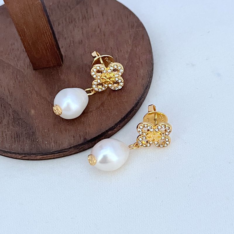 Image showing the profile and the secure friction-back post closure, emphasizing the earring's lightweight structure and comfortable design for all-day wear.