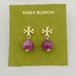 Tory Burch earrings with pink beads on a green card