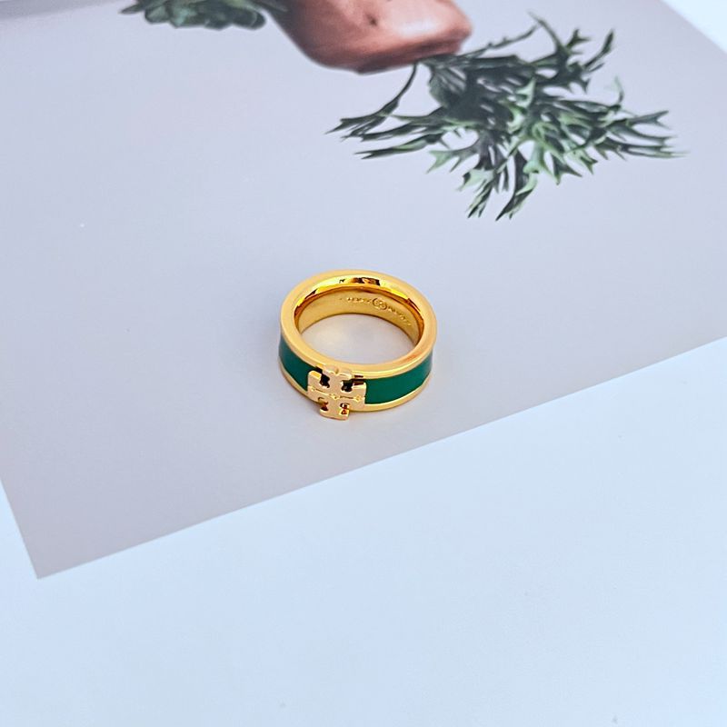 A confident individual with a modern, minimalist outfit, using the ring as the standout accessory. The focus is on the hand and the ring's impact.