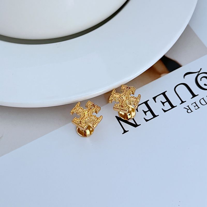  Clean, front-facing shot of a single large stud on a plain background, with a subtle scale reference (like a coin) to emphasize its substantial size.