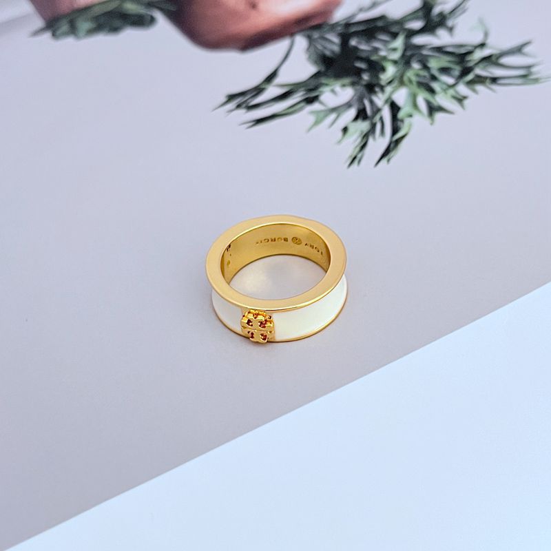  Clean, direct shot of the ring on a neutral background, showcasing the wide band, enamel color, and prominent logo.