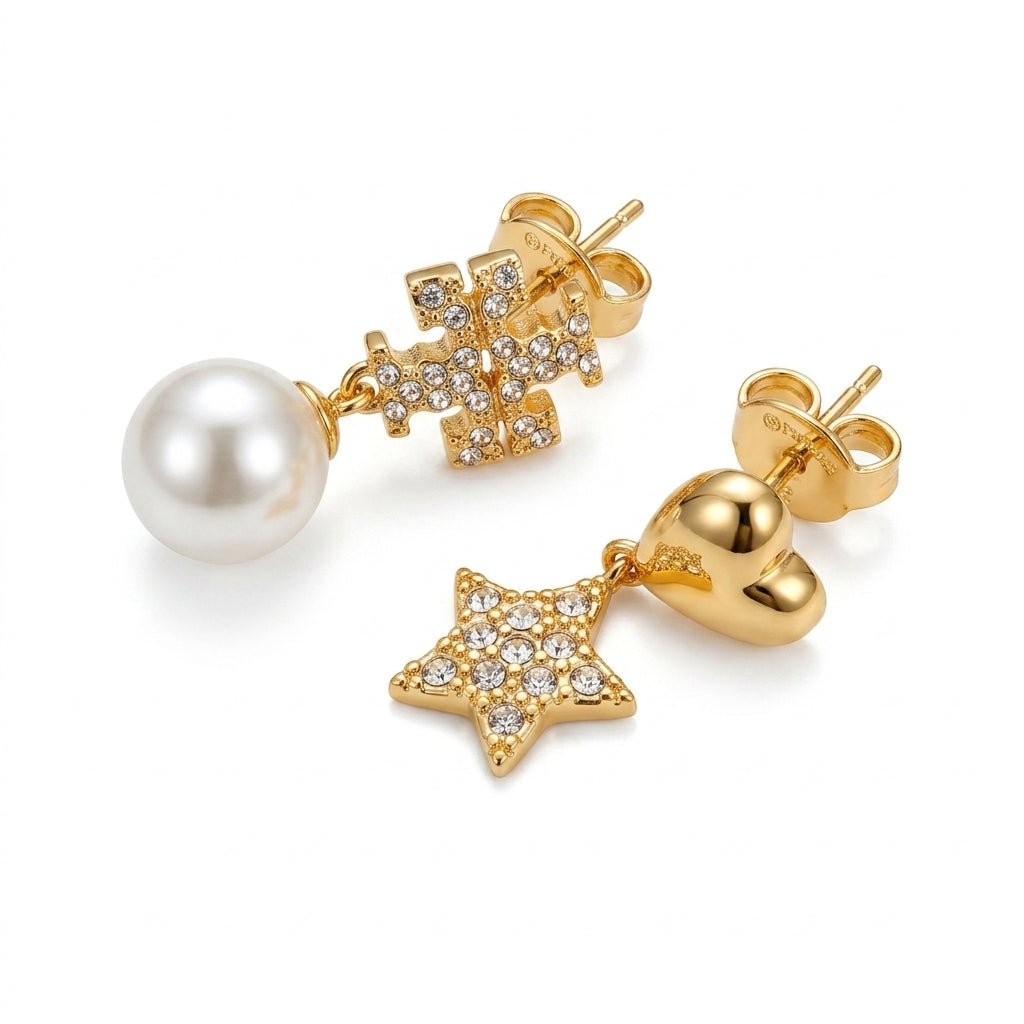 Pair of gold earrings with star and heart charms on a white background
